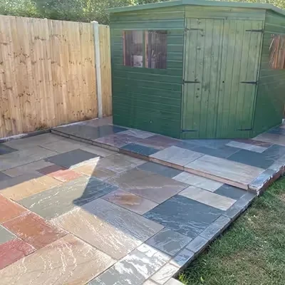 patio with green shed